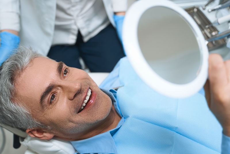 dental patient smiling after procedure